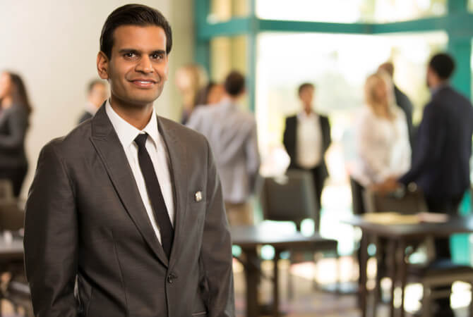 A confident look man in a suit