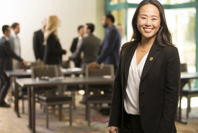 Young woman at a meeting.