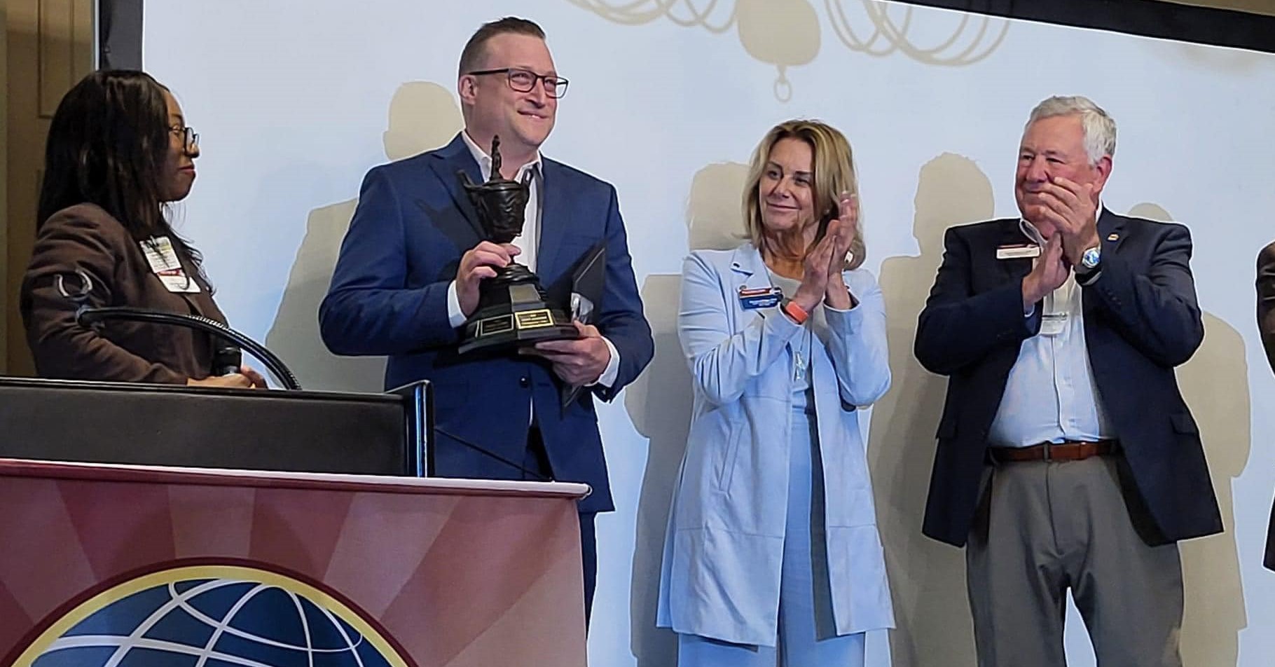 Stefano Cossalter receiving the trophy