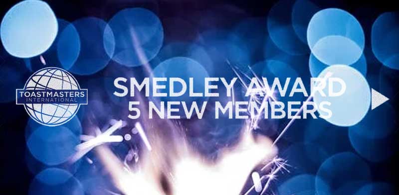 Sparker background with the words 'Smedley Award 5 New Members" with the Toastmaster logo.